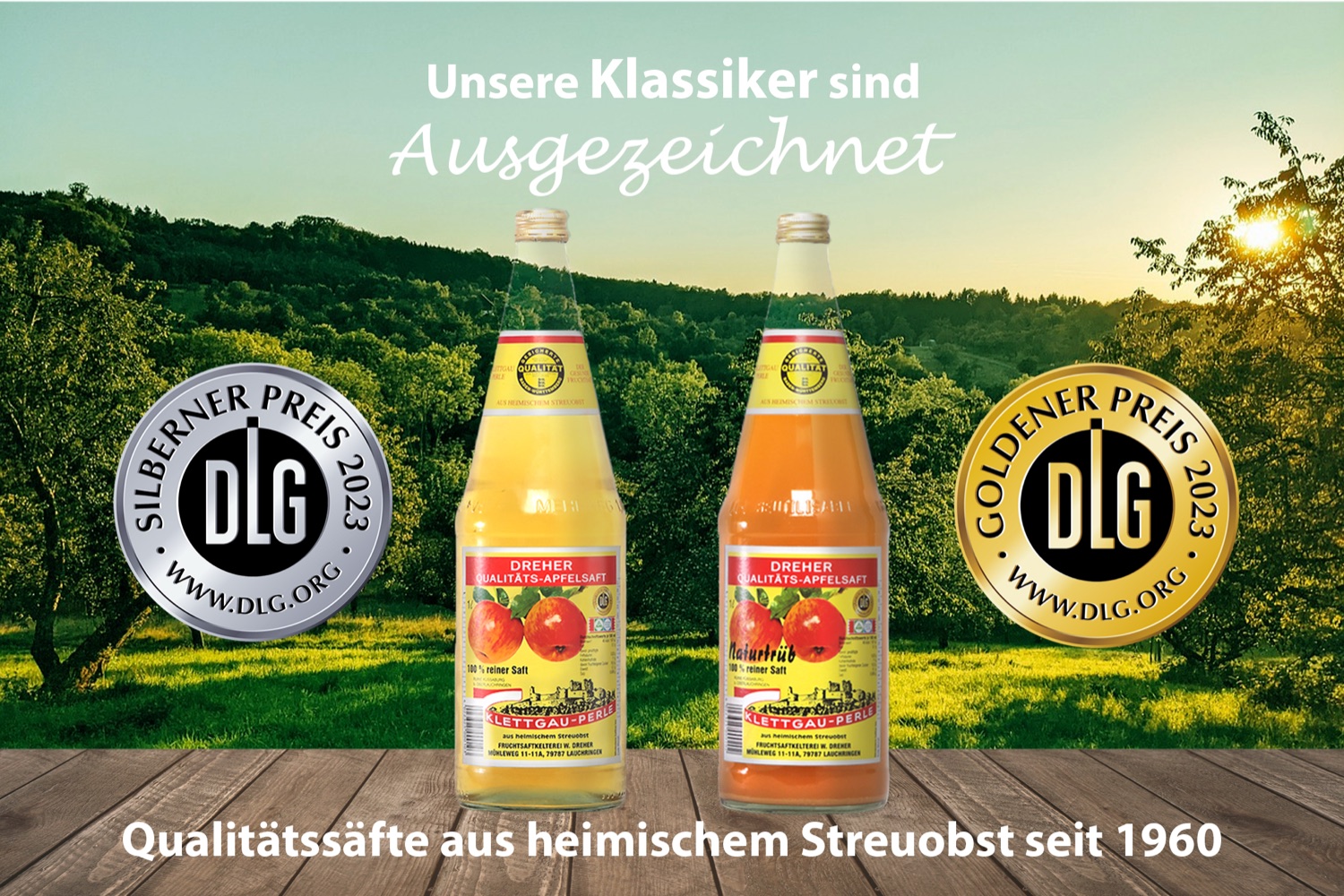 Zwei Flaschen Dreher Qualitäts-Apfelsaft (klar und naturtrüb) der Marke Klettgau-Perle, daneben die DLG-Auszeichnungen in Silber und Gold 2023.